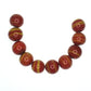 Random striped orange round bead