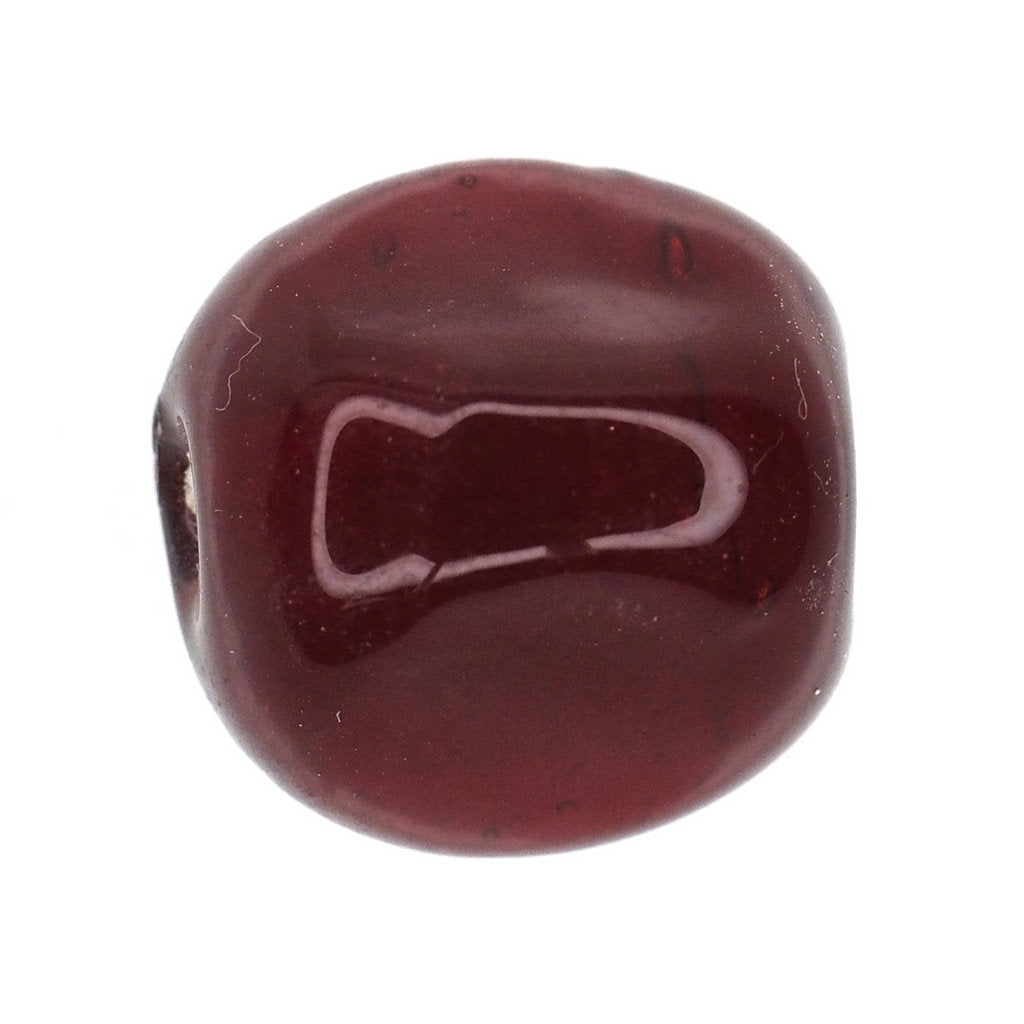 Three sided red bead