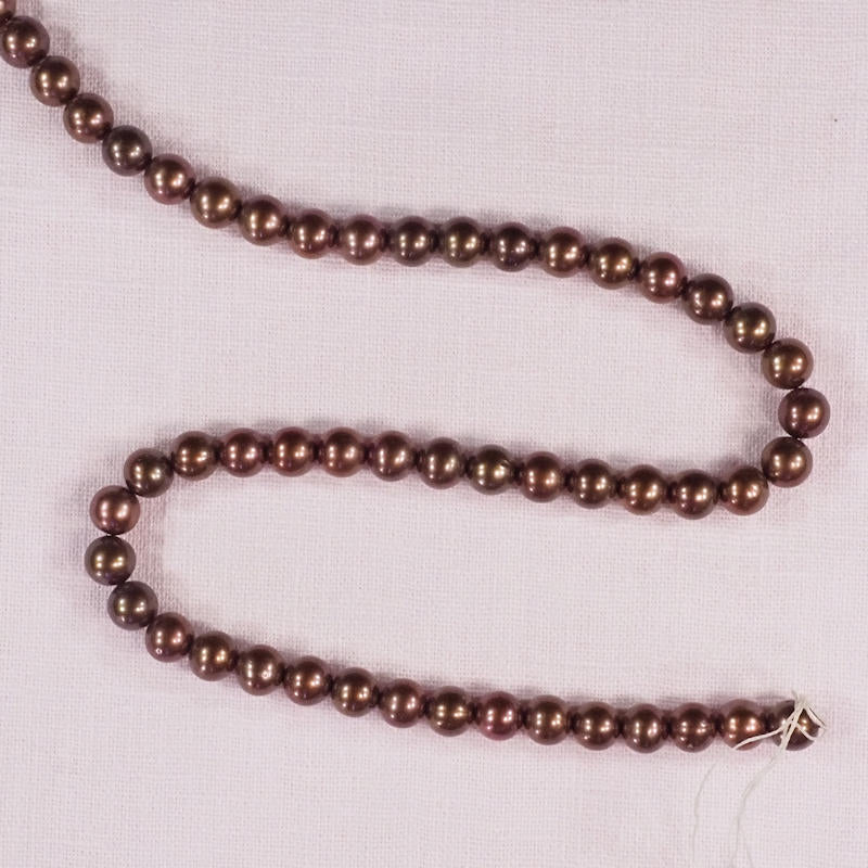 6 mm round copper colored pearls