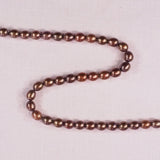 8 mm pink-copper oval shaped pearls