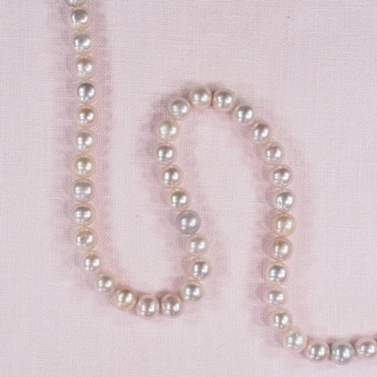 6 mm uniformly round pink pearls