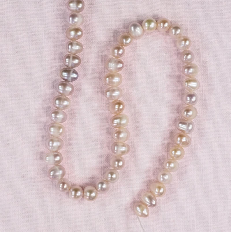 6 mm side-drilled oval pink pearls