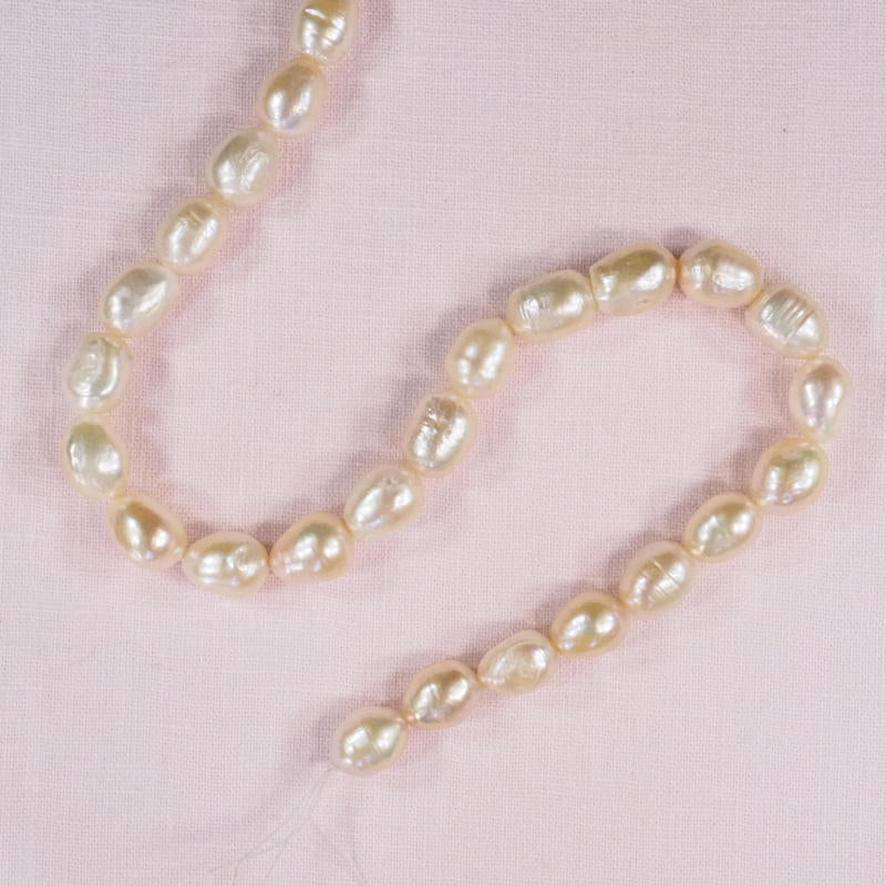 14 mm soft white oval pearls