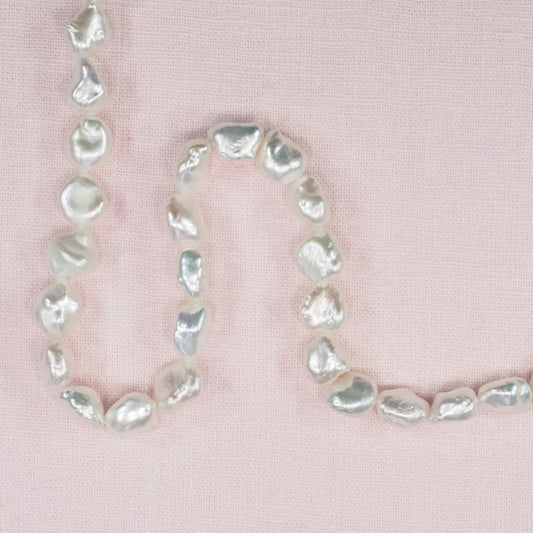 10 mm by 8 mm white irregular pearls