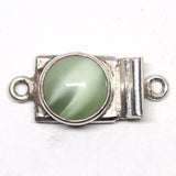 Round green clasp