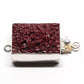 Maroon flower clasp