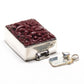 Maroon flower clasp