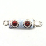 Double garnet clasp