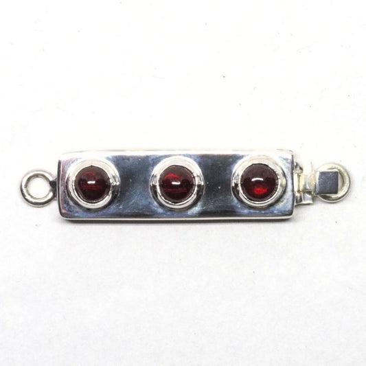 Triple garnet clasp