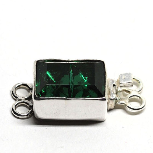 Emerald double-X clasp