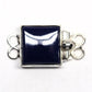 Glass lapis clasp