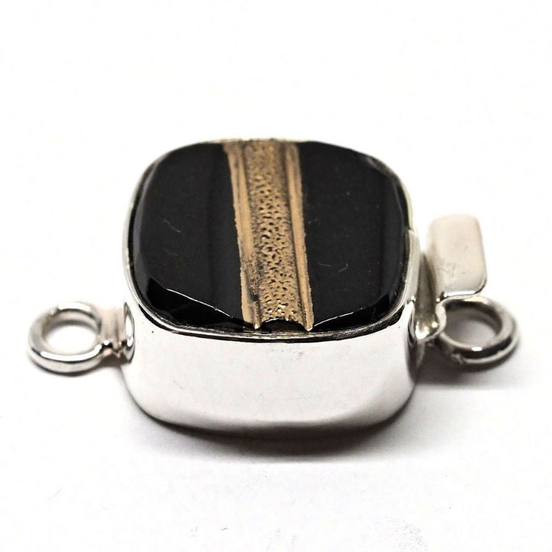 Black and gold tailored clasp