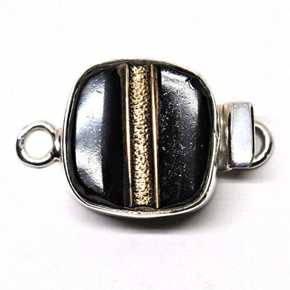 Black and gold tailored clasp