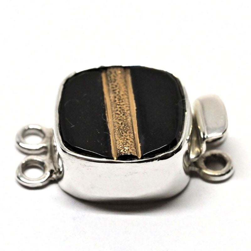 Black and gold tailored clasp