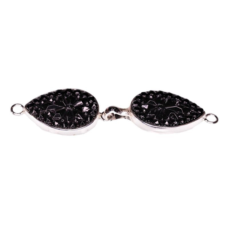 Sharp cut black hook clasp