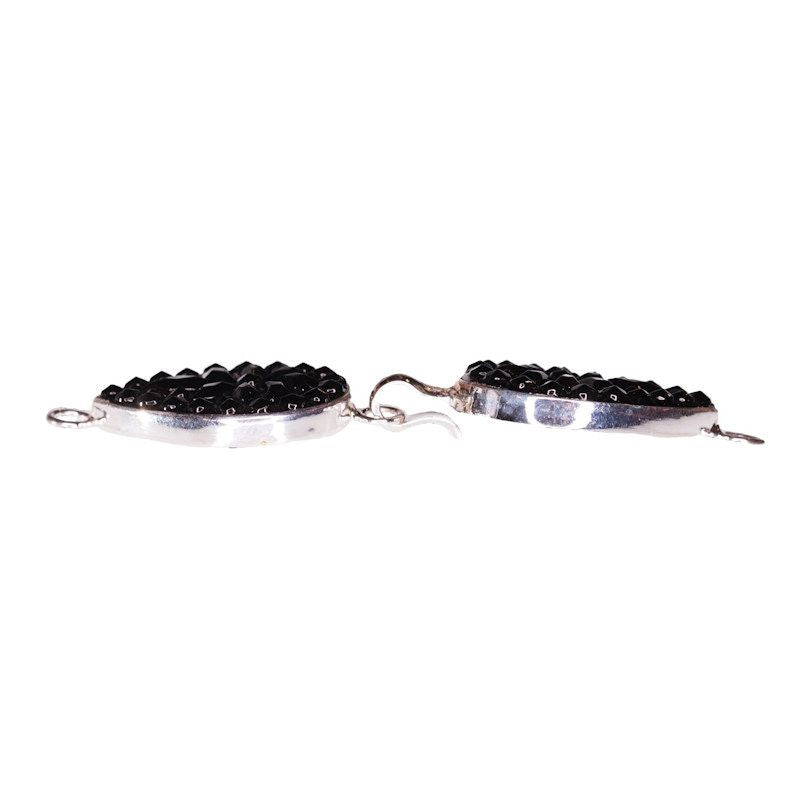 Sharp cut black hook clasp