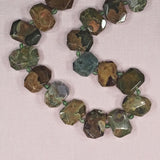 22 mm by 15 mm irregular polished rhyolite hexagon beads