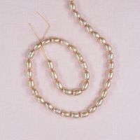 6 mm oval pink-peach pearls